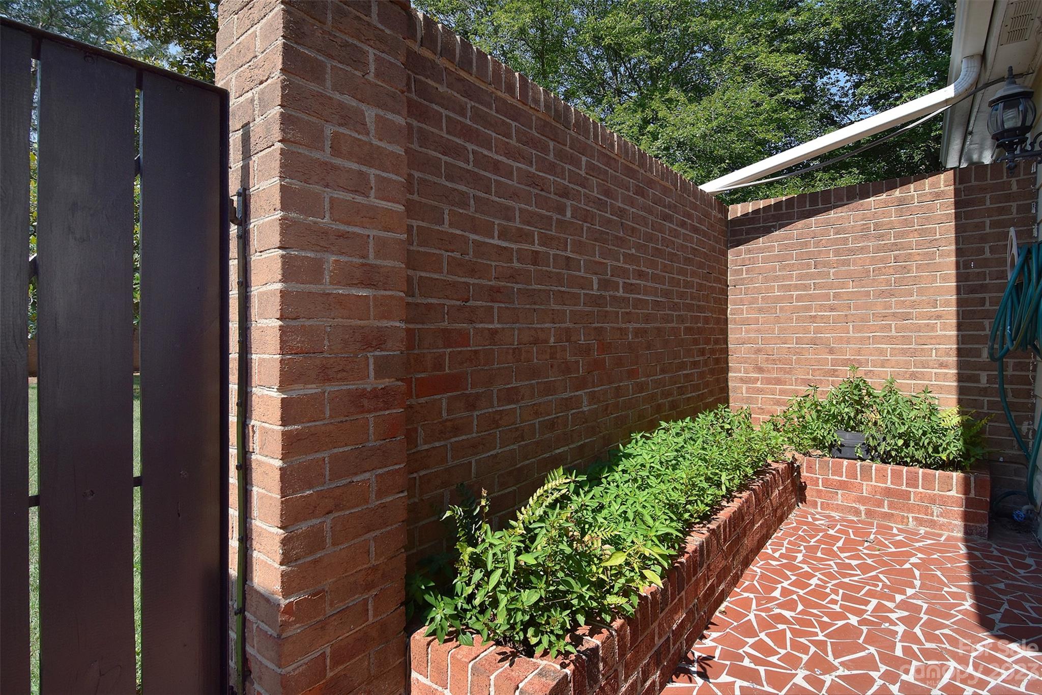 4415 Simsbury Road Charlotte, NC 28226 - Photo 33 of 36 a view of a pathway with a house