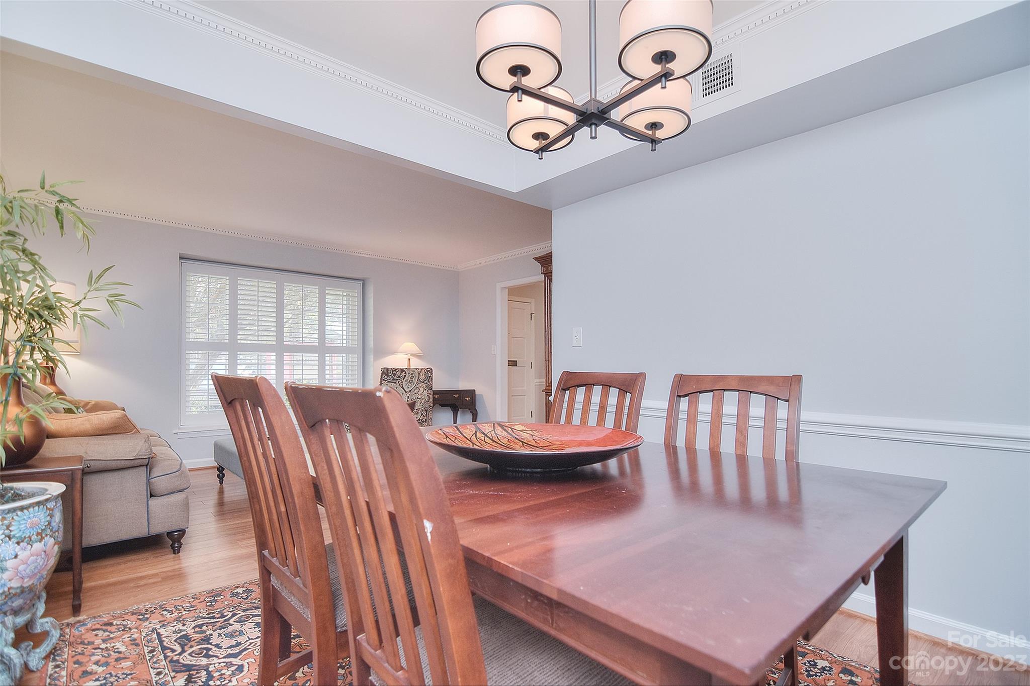 4415 Simsbury Road Charlotte, NC 28226 - Photo 8 of 36 a view of a dining room with furniture