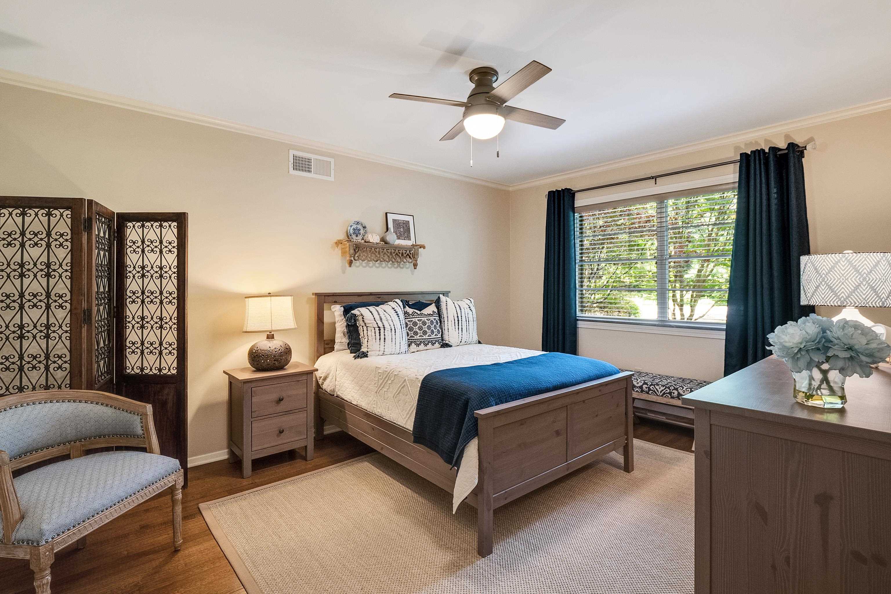 45 South Rose Road Memphis, TN 38111 - Photo 15 of 25 a bedroom with a bed and window