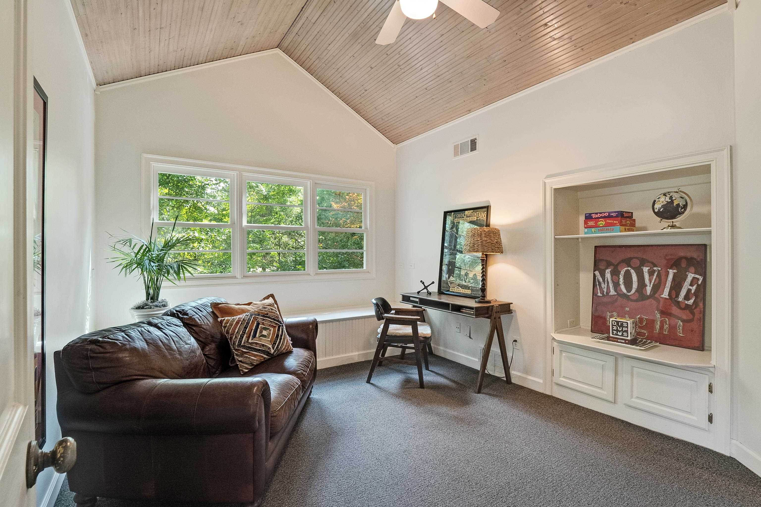 45 South Rose Road Memphis, TN 38111 - Photo 18 of 25 a living room with furniture and a window