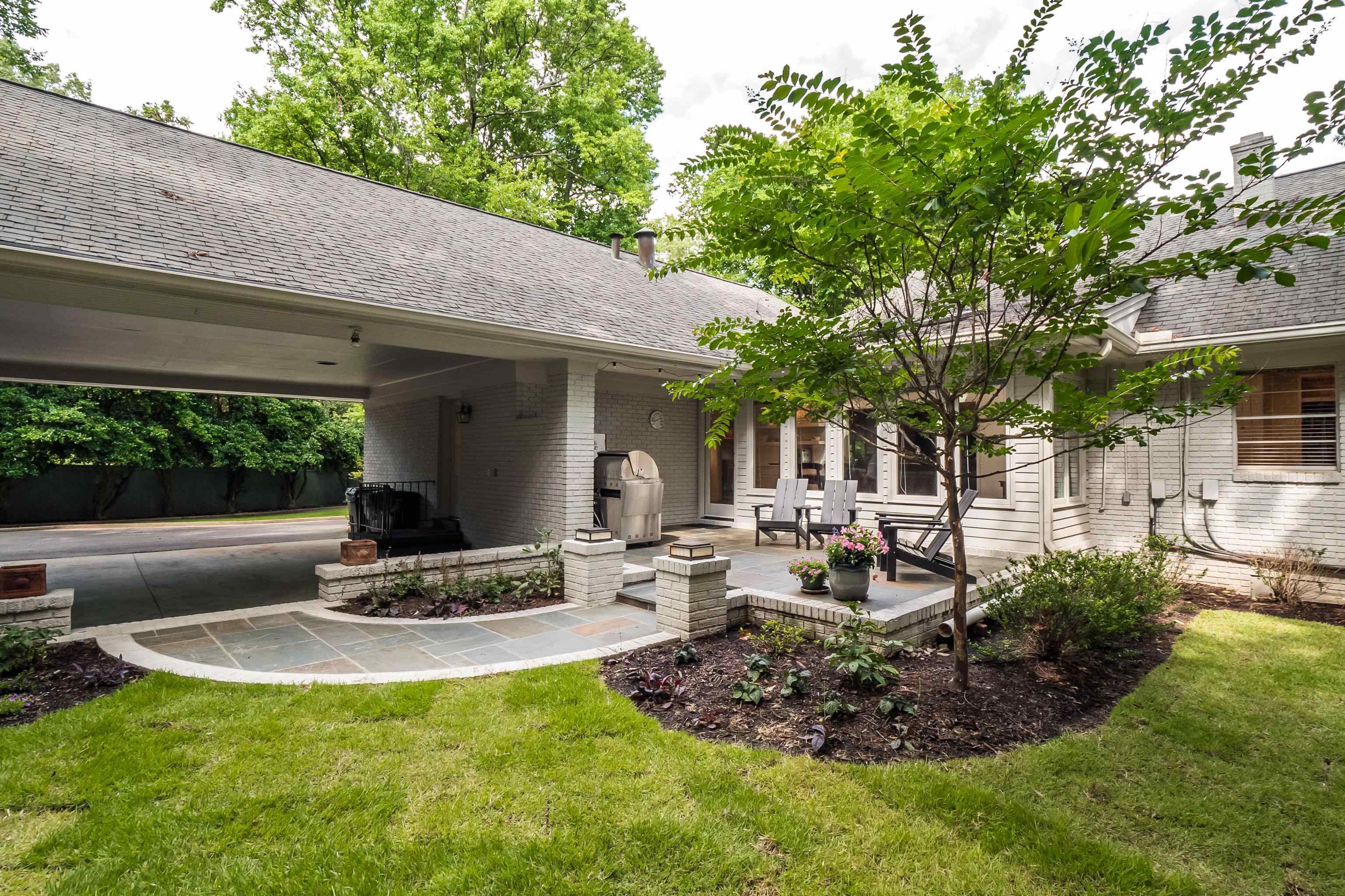 45 South Rose Road Memphis, TN 38111 - Photo 25 of 25 a view of a house with backyard and sitting area