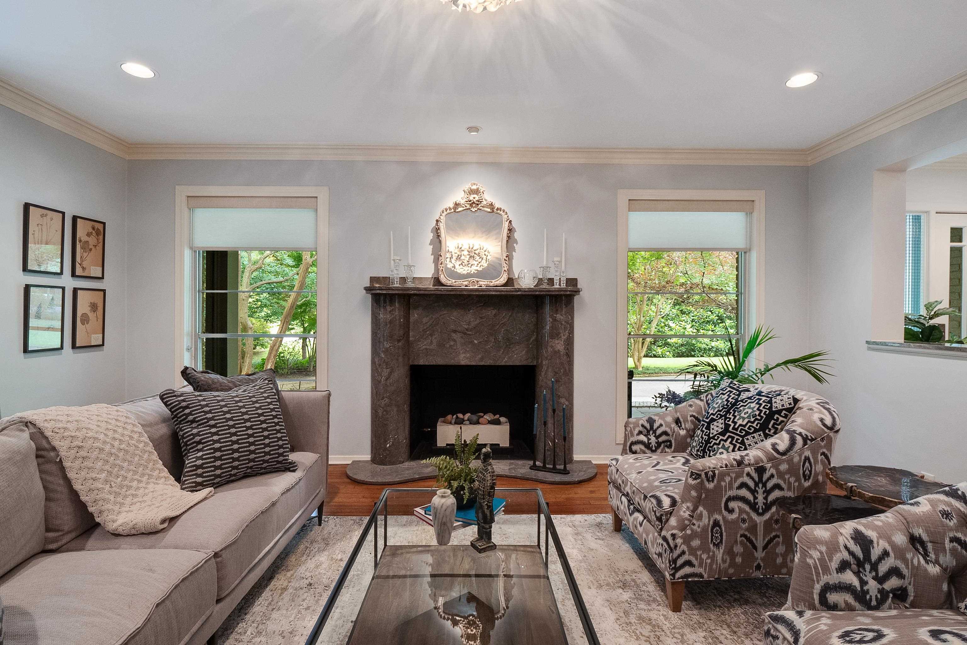 45 South Rose Road Memphis, TN 38111 - Photo 5 of 25 a living room with furniture and a fireplace