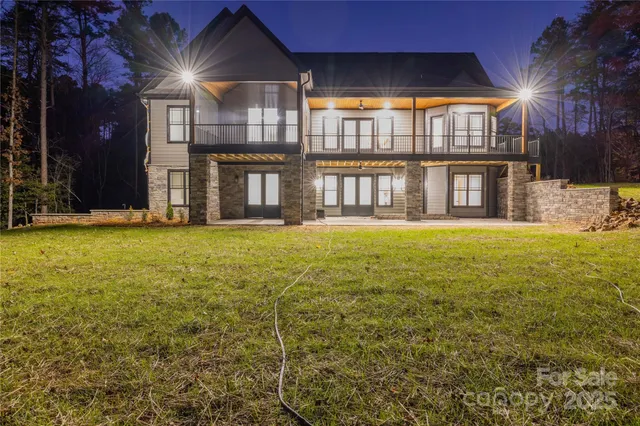 a large building with a yard in front of it