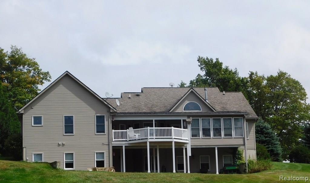 3335 North Cedar Road Fowlerville, MI 48836 - Photo 27 of 27 3335 Cedar - back of house.jpg