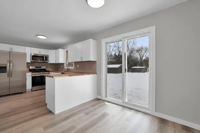 $395,000 | 8421 156th Lane Northwest, Ramsey, MN 55303