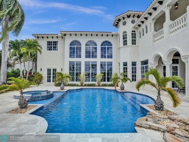 a dining room with furniture window and outside view