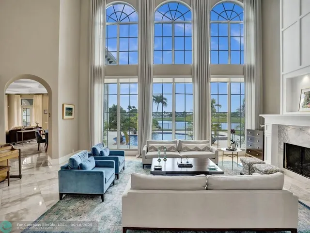 a view of a dining room with furniture window chandelier
