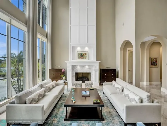 a kitchen with a stove a refrigerator and a sink