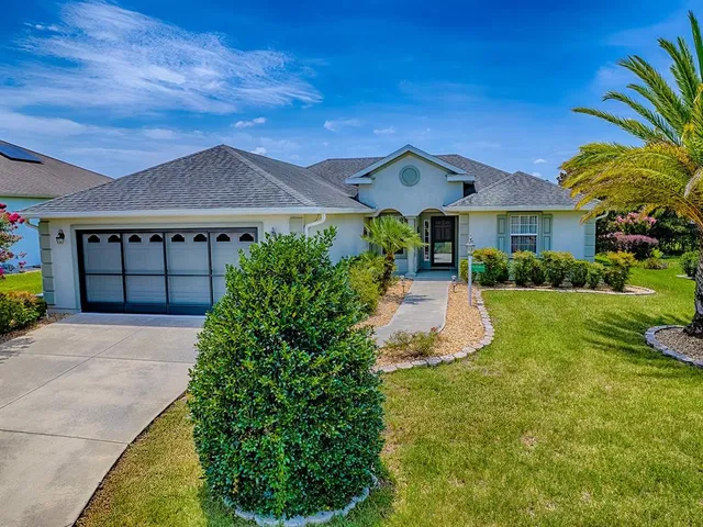 a living room with a book shelf