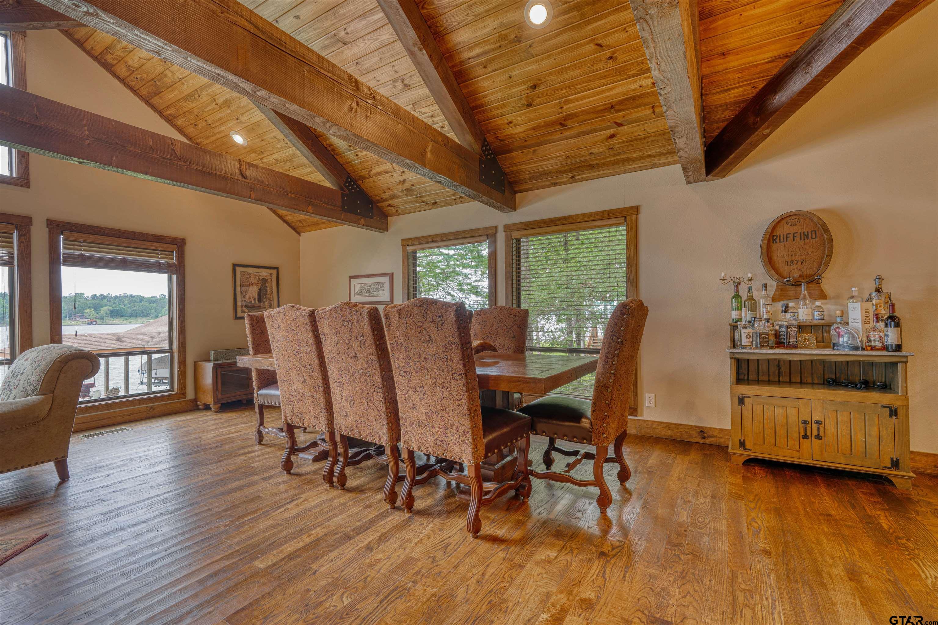 144 King Lyle Road Scroggins, TX 75480 - Photo 25 of 48 a view of a dining room with furniture and wooden floor
