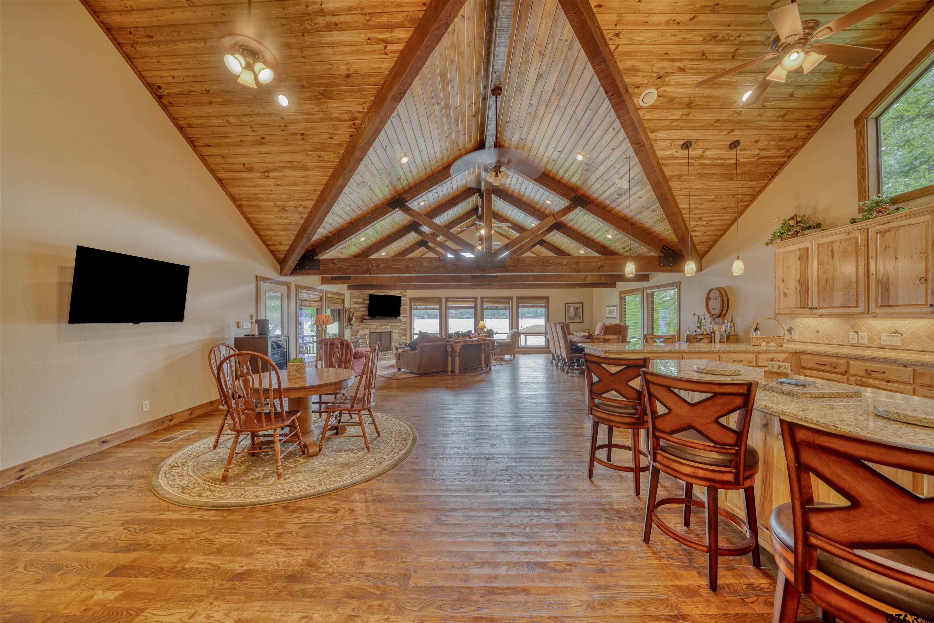 144 King Lyle Road Scroggins, TX 75480 - Photo 26 of 48 a view of a dining room with furniture and wooden floor