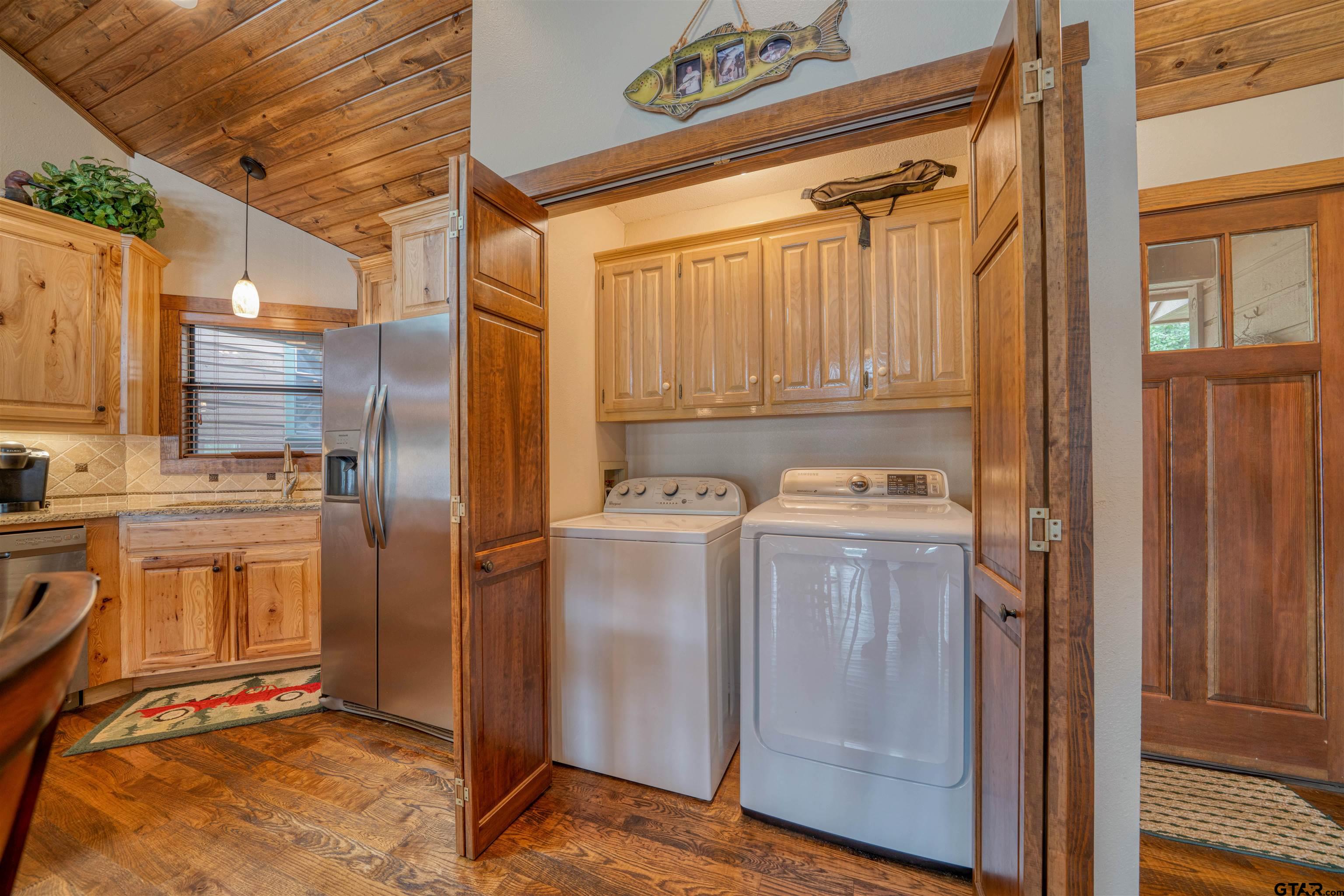144 King Lyle Road Scroggins, TX 75480 - Photo 32 of 48 a view of a refrigerator in kitchen and a sink