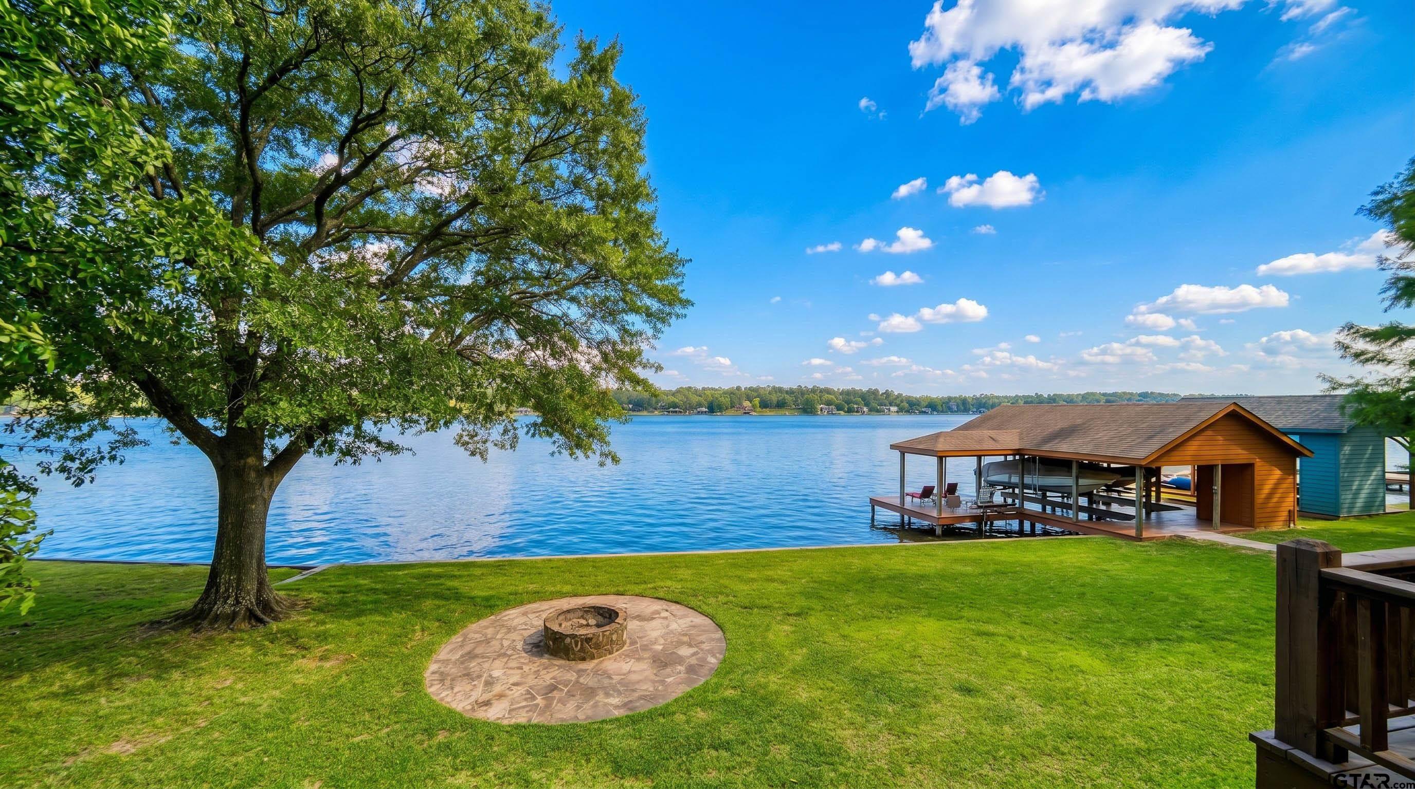 144 King Lyle Road Scroggins, TX 75480 - Photo 4 of 48 a view of a big house with a big yard