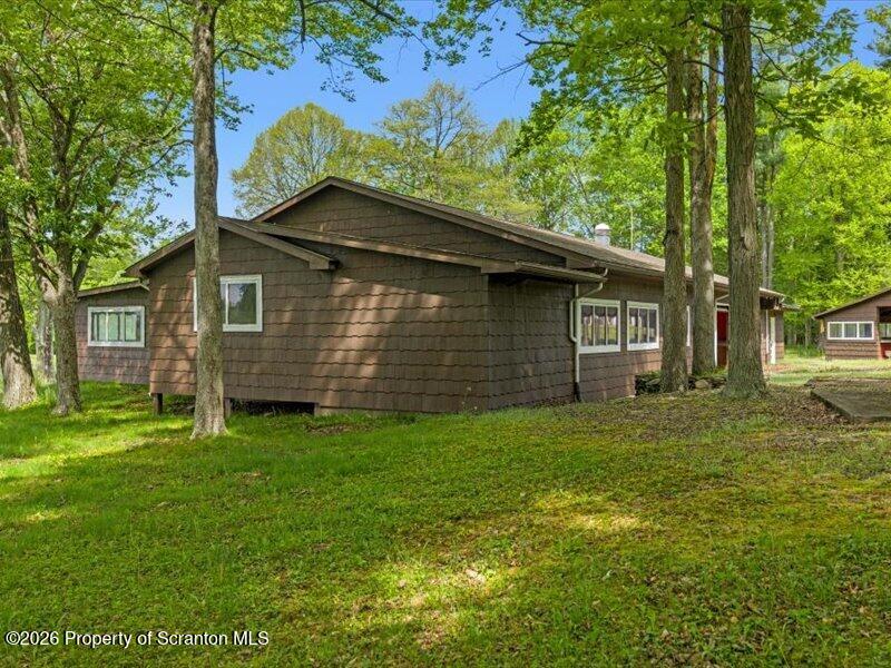 9-17 Vago Road Tunkhannock, PA 18657 - Photo 53 of 57 a backyard of a house with lots of green space