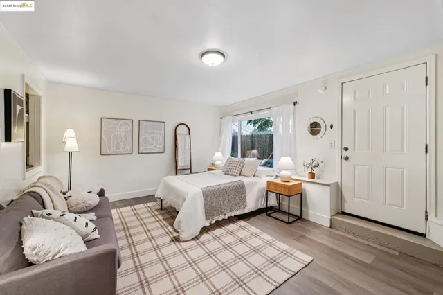 a kitchen with granite countertop a sink stove and cabinets