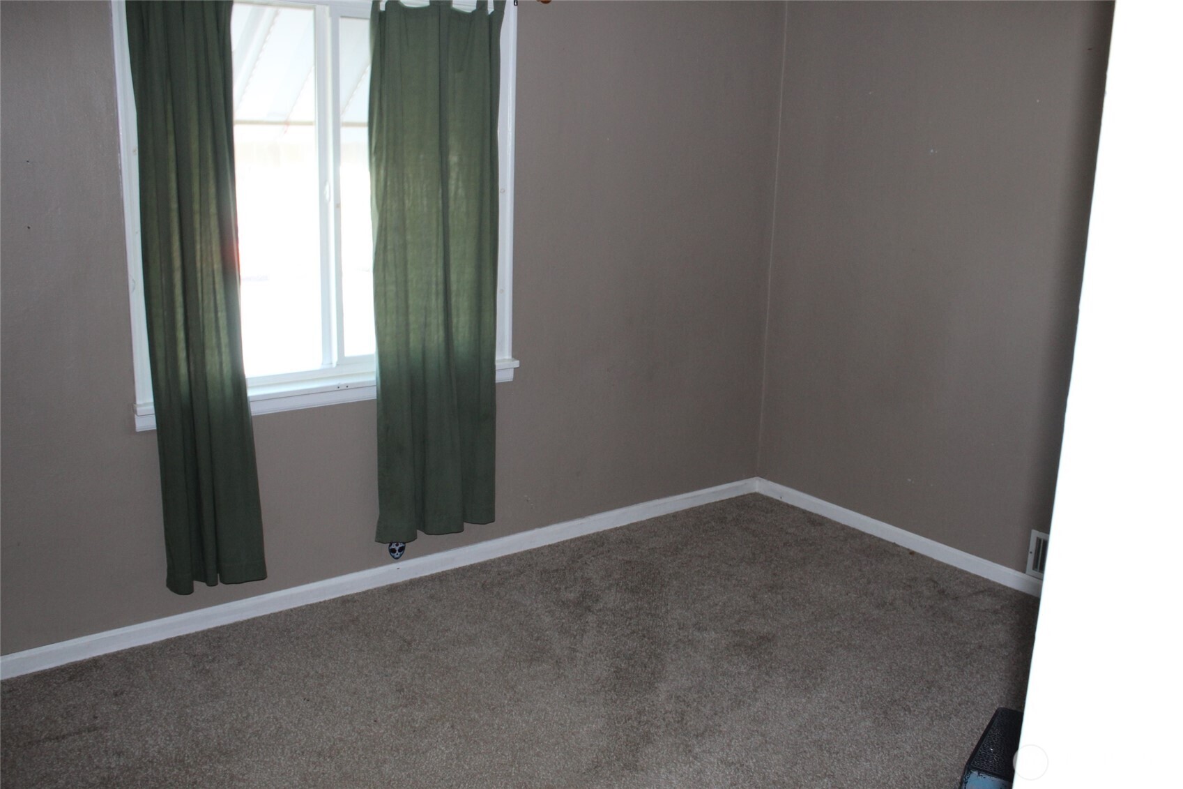 104 East 5th Avenue Ritzville, WA 99169 - Photo 6 of 19 an empty room with windows