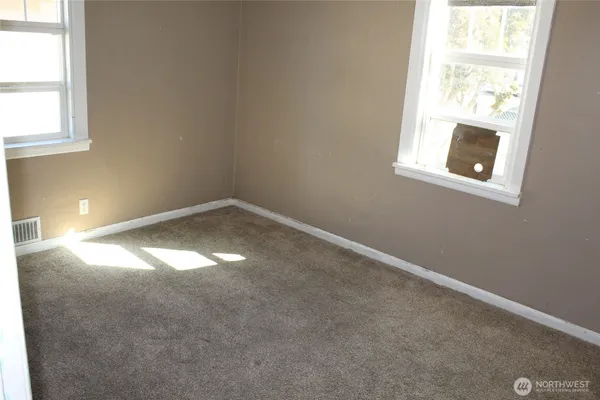an empty room with a window