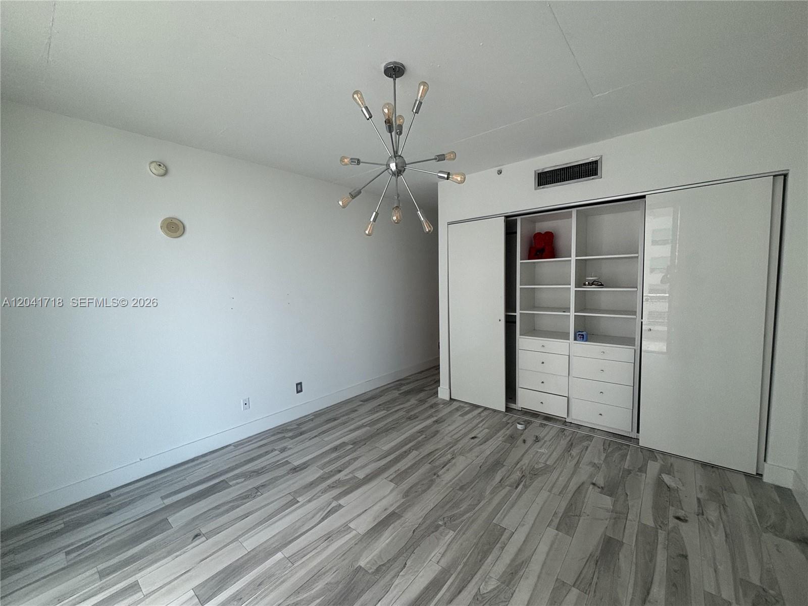 690 Southwest 1st Court, Unit 2124 Miami, FL 33130 - Photo 14 of 20 a view of an empty room with a window