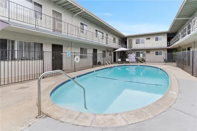 a view of street with parked cars