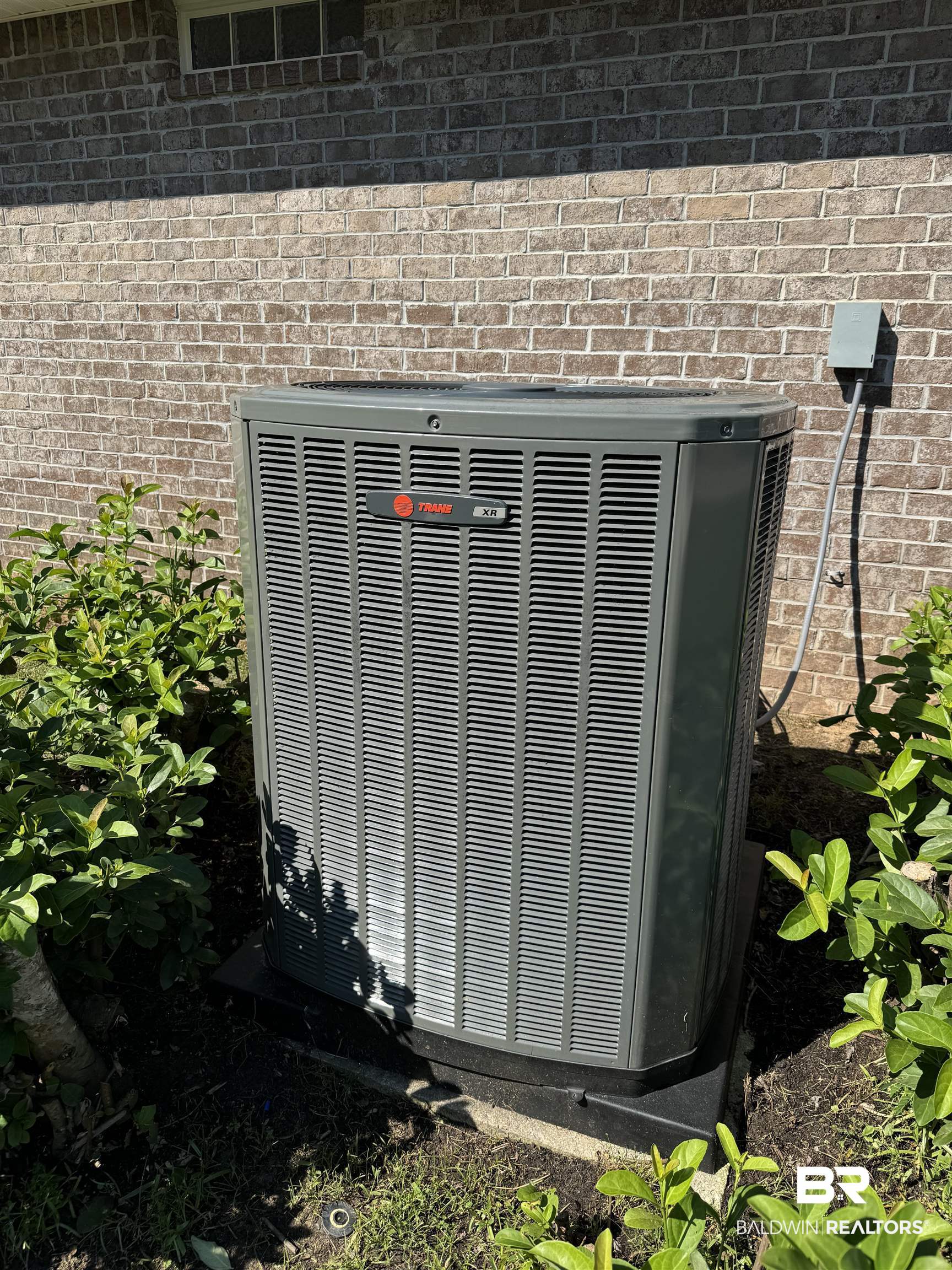 32769 Arbor Ridge Circle Lillian, AL 36549 - Photo 33 of 36 Exterior details with cooling unit