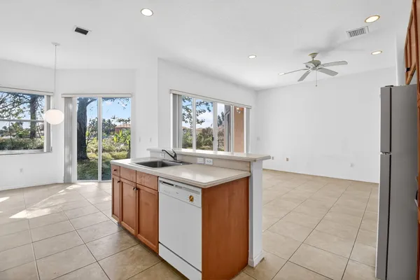 a kitchen with a stove and a sink