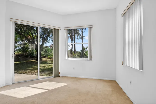 a view of a room with a large window