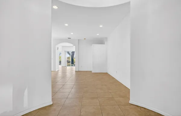 a view of a hallway with a window