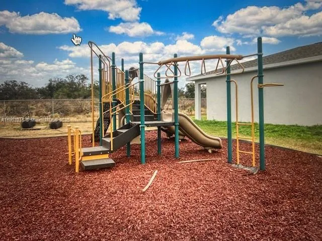 a view of a park with slide