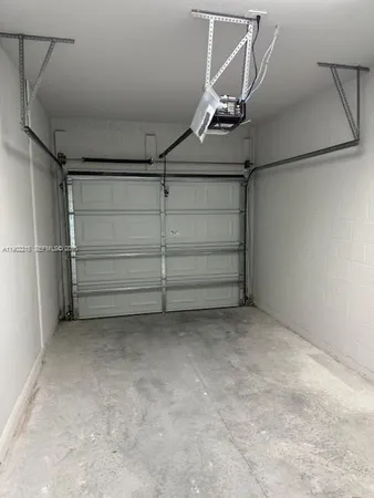 a view of storage and utility room with racks on the wall
