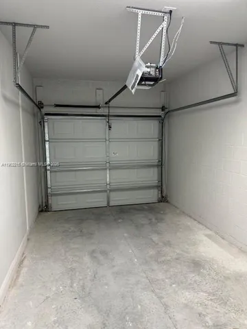 a view of storage and utility room with racks on the wall