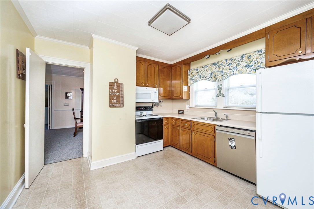 4912 Water View Road Water View, VA 23180 - Photo 20 of 42 Kitchen with wood cabinetry, light-toned counterto