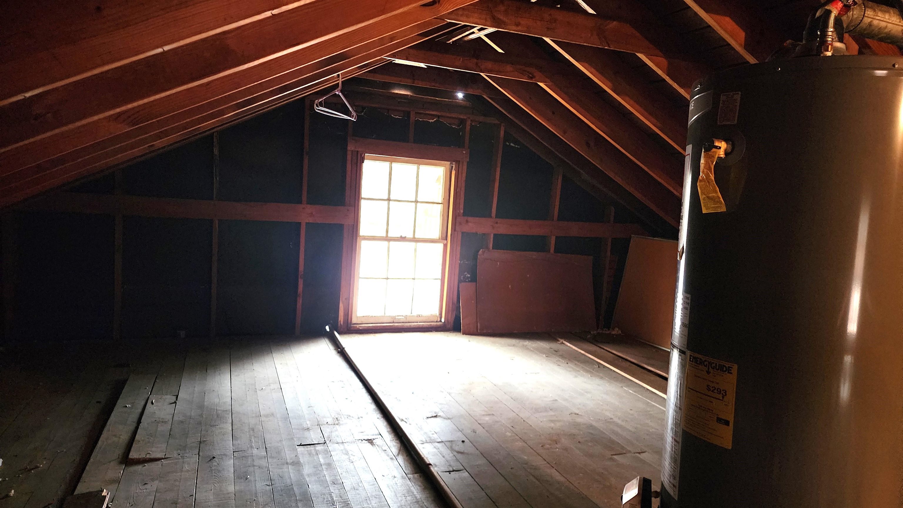 925 Inman Road Memphis, TN 38111 - Photo 13 of 17 Attic is floored and has lots of space. A home down the street has the same floor plan as this house and they moved the water heater downstairs and converted the attic to a loft area.