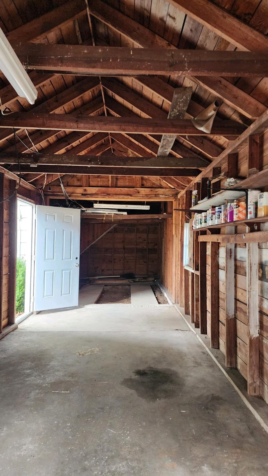 925 Inman Road Memphis, TN 38111 - Photo 15 of 17 This garage is 39+ ft deep from door to wall. There is so much potential for this garage. If you take half of it and add it to the living space, there is still plenty of room for a garage.