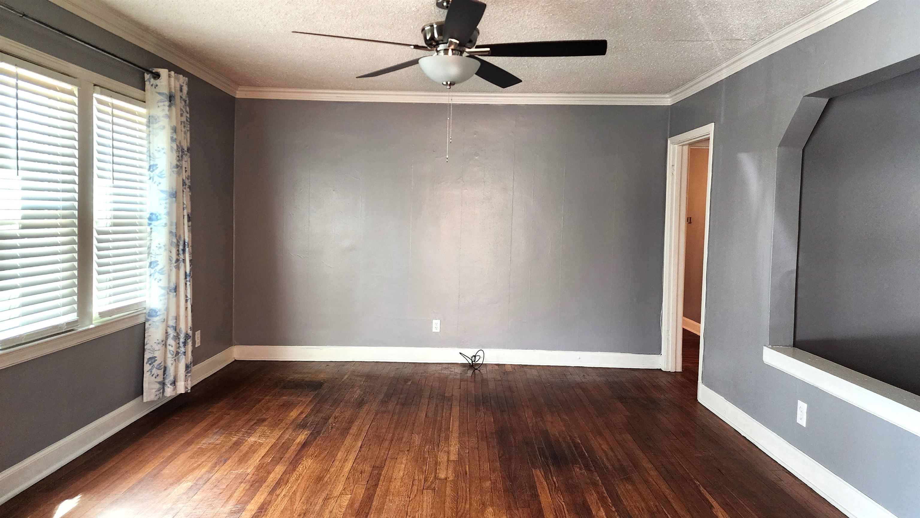 This room has plenty of natural light and hardwood floors.  It is an open plan where you can see through to the dining room and the kitchen area.  You can host your quests and cook at the same time.