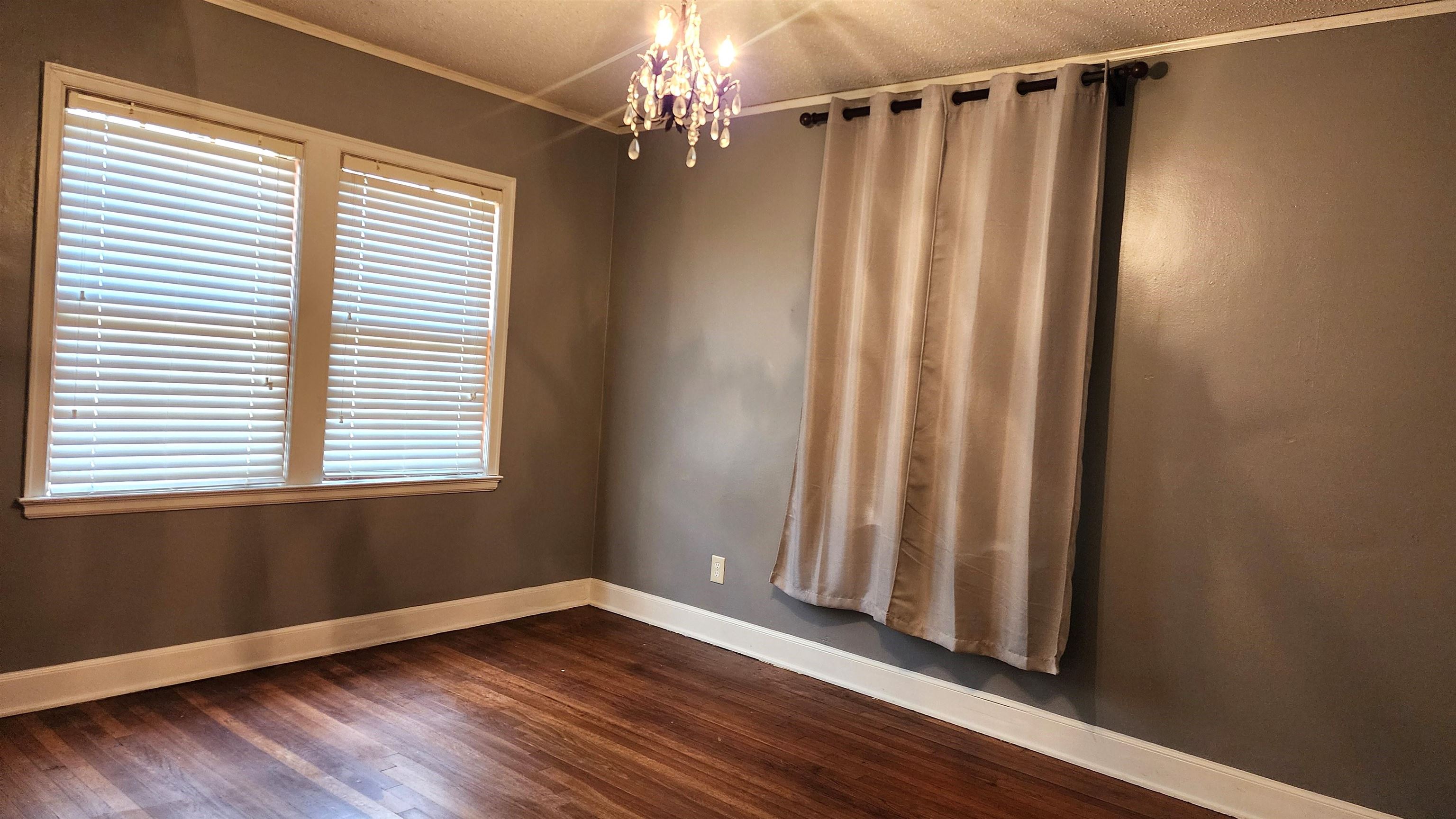 925 Inman Road Memphis, TN 38111 - Photo 9 of 17 This bedroom has tons of natural light, hardwood floors and a large closet.