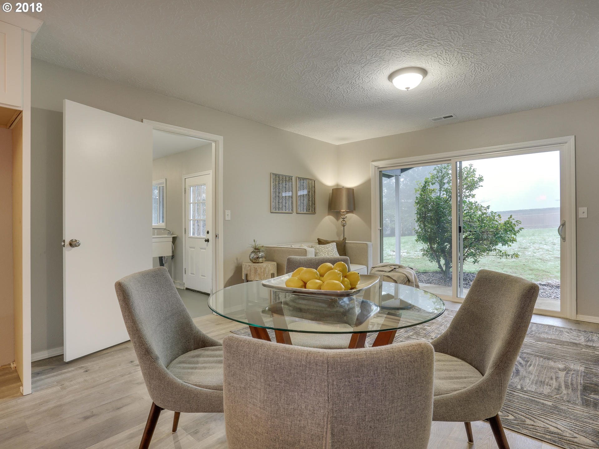 21130 Southeast Foster Road Damascus, OR 97089 - Photo 16 of 30 a kitchen with a table and chairs