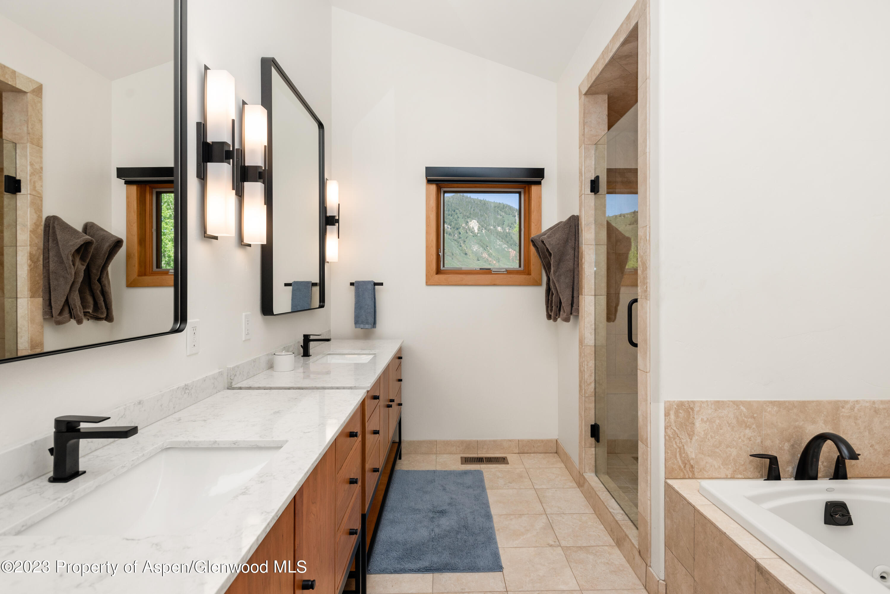 210 Horseshoe Drive Basalt, CO 81621 - Photo 16 of 52 a bathroom with a sink and a mirror