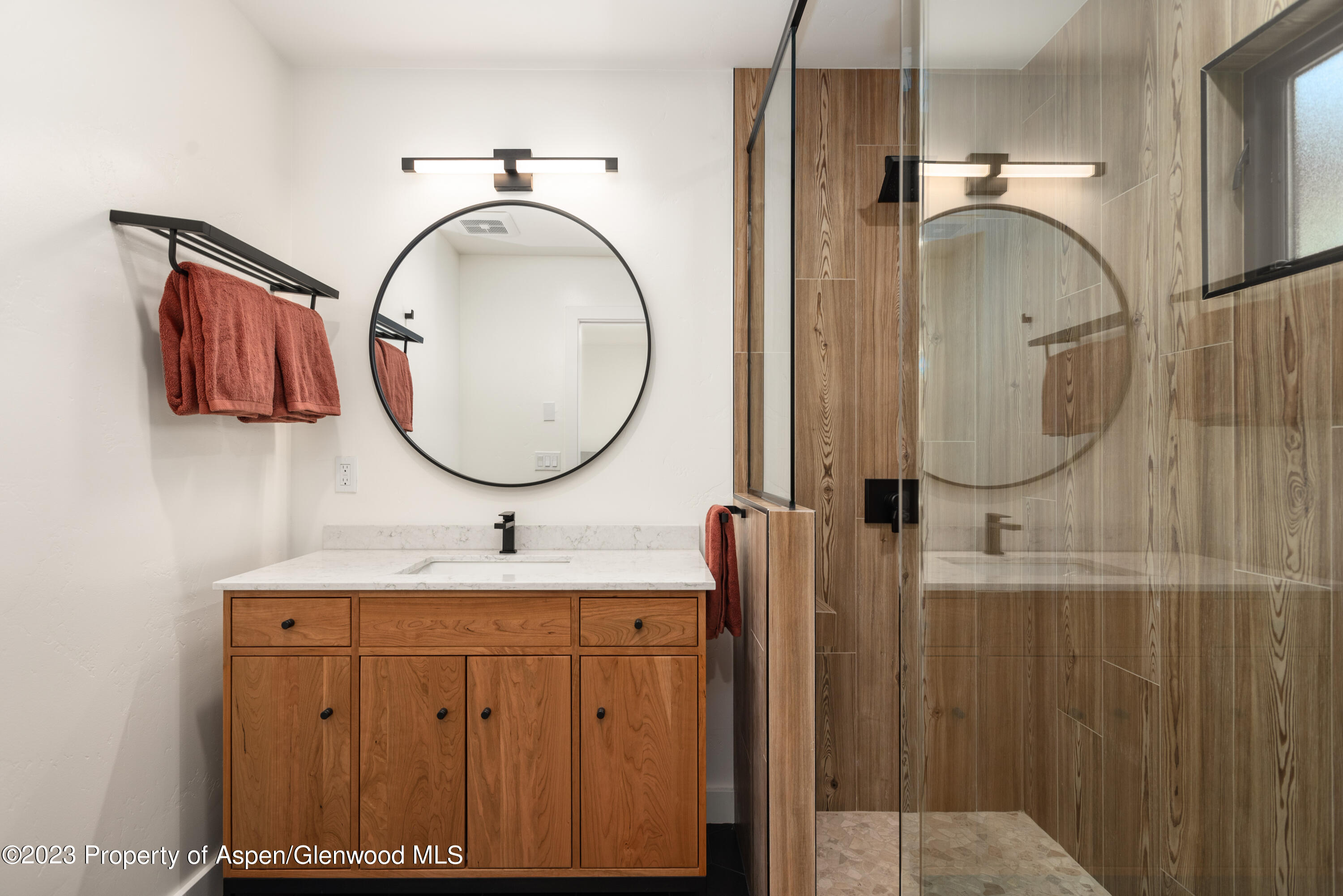 210 Horseshoe Drive Basalt, CO 81621 - Photo 24 of 52 a bathroom with a sink vanity mirror and tub
