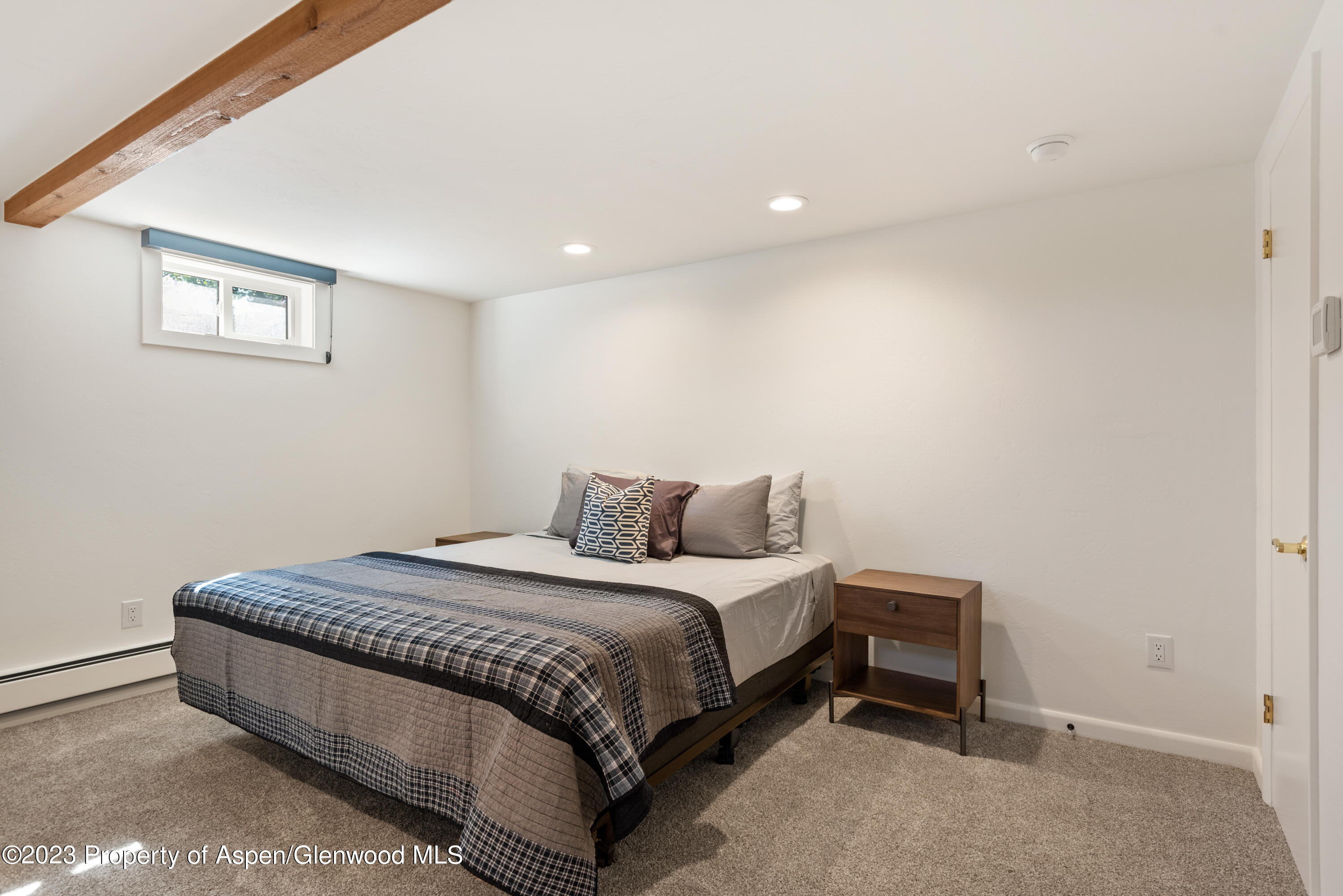 210 Horseshoe Drive Basalt, CO 81621 - Photo 30 of 52 a bed room with a bed and a night stand