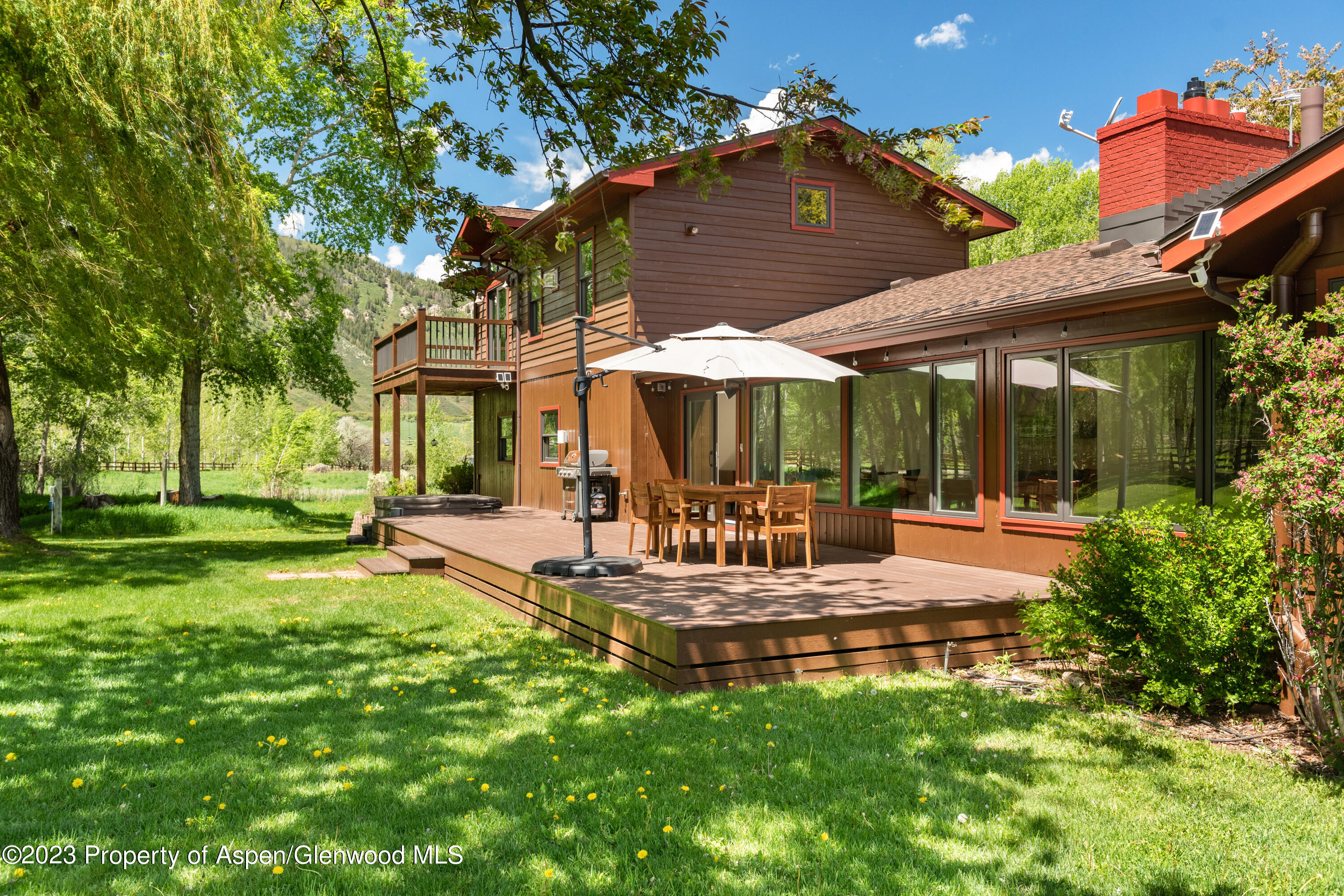 210 Horseshoe Drive Basalt, CO 81621 - Photo 39 of 52 a view of a house with backyard and sitting area