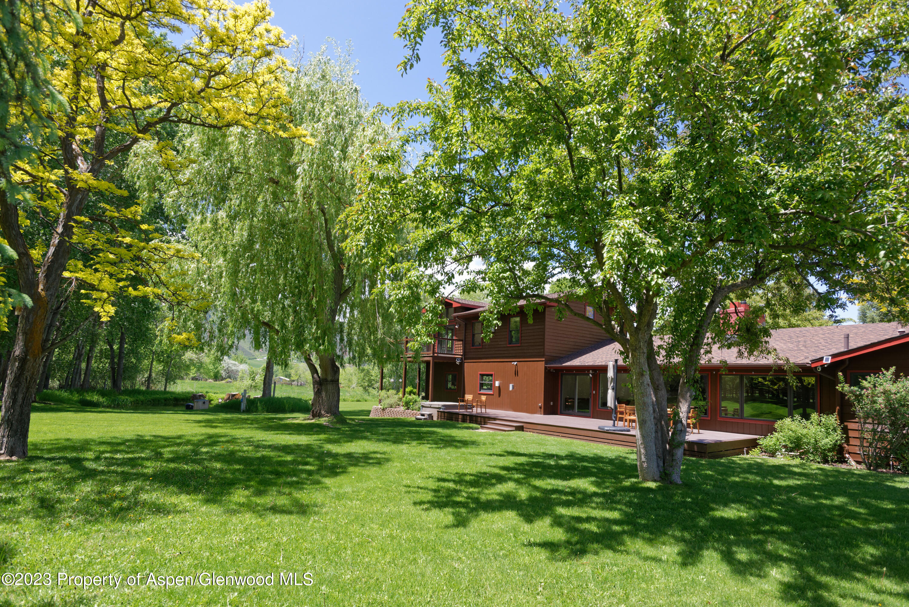 210 Horseshoe Drive Basalt, CO 81621 - Photo 40 of 52 a backyard of a house with lots of green space