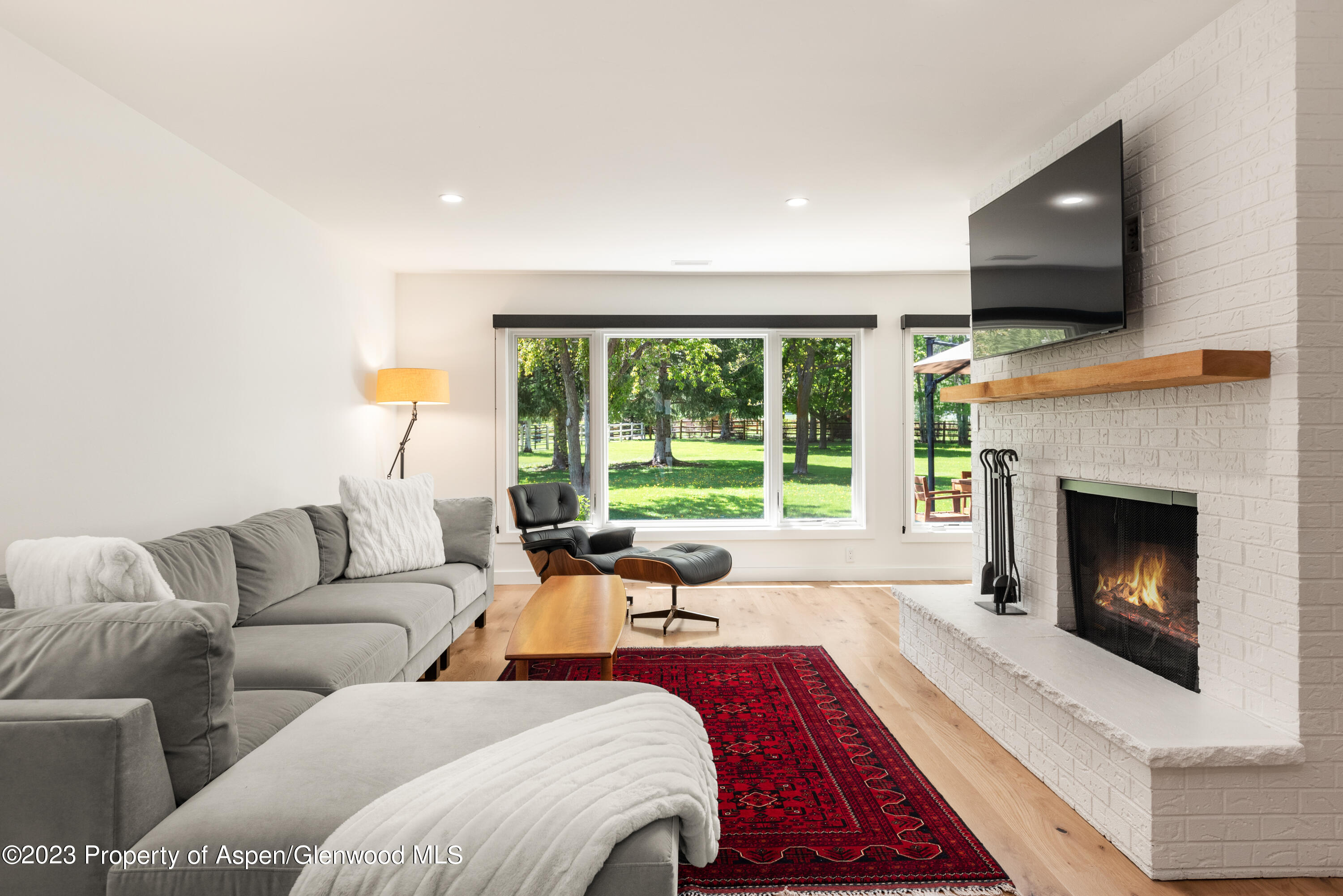 210 Horseshoe Drive Basalt, CO 81621 - Photo 5 of 52 a living room with furniture fireplace and flat screen tv