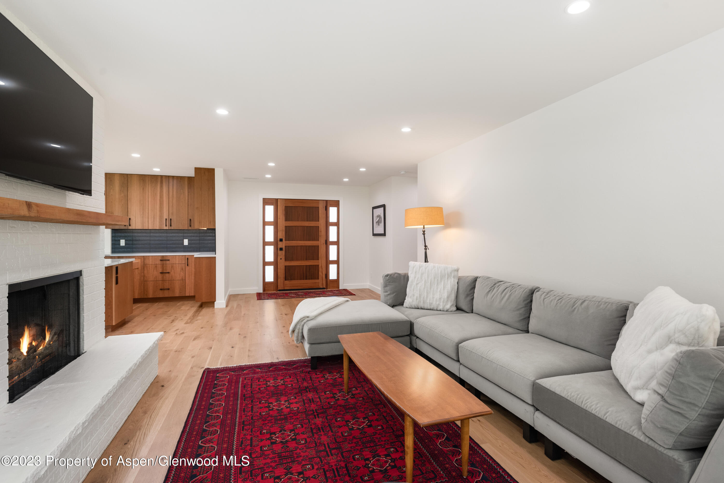 210 Horseshoe Drive Basalt, CO 81621 - Photo 6 of 52 a living room with furniture and a fireplace