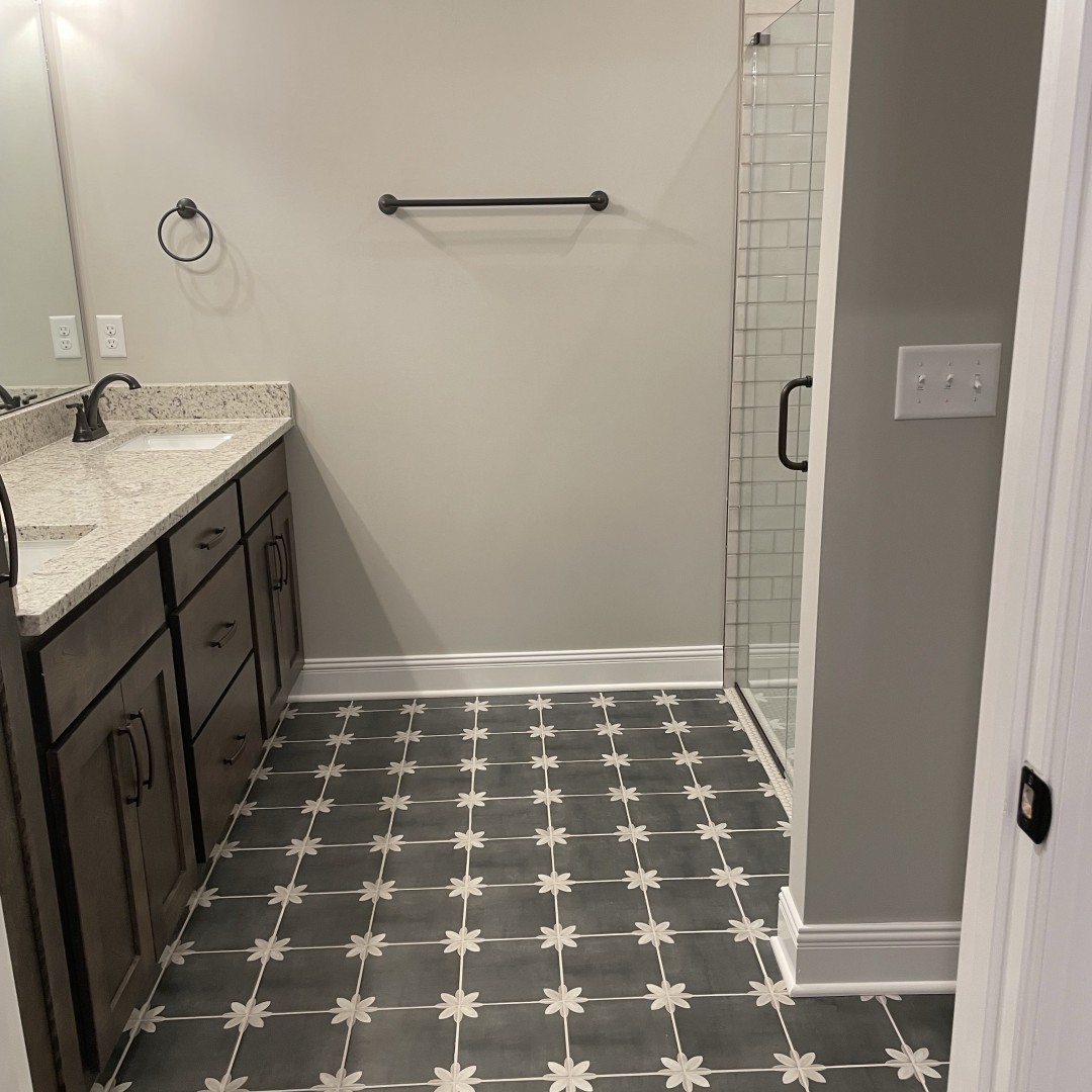 2063 Rylee Way Greenbrier, TN 37073 - Photo 12 of 19 a bathroom with a black and white checkered floor