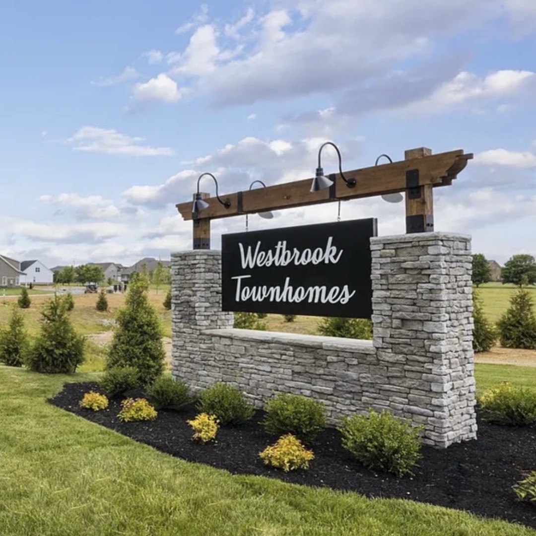 2063 Rylee Way Greenbrier, TN 37073 - Photo 19 of 19 a view of a sign board with buildings in the background