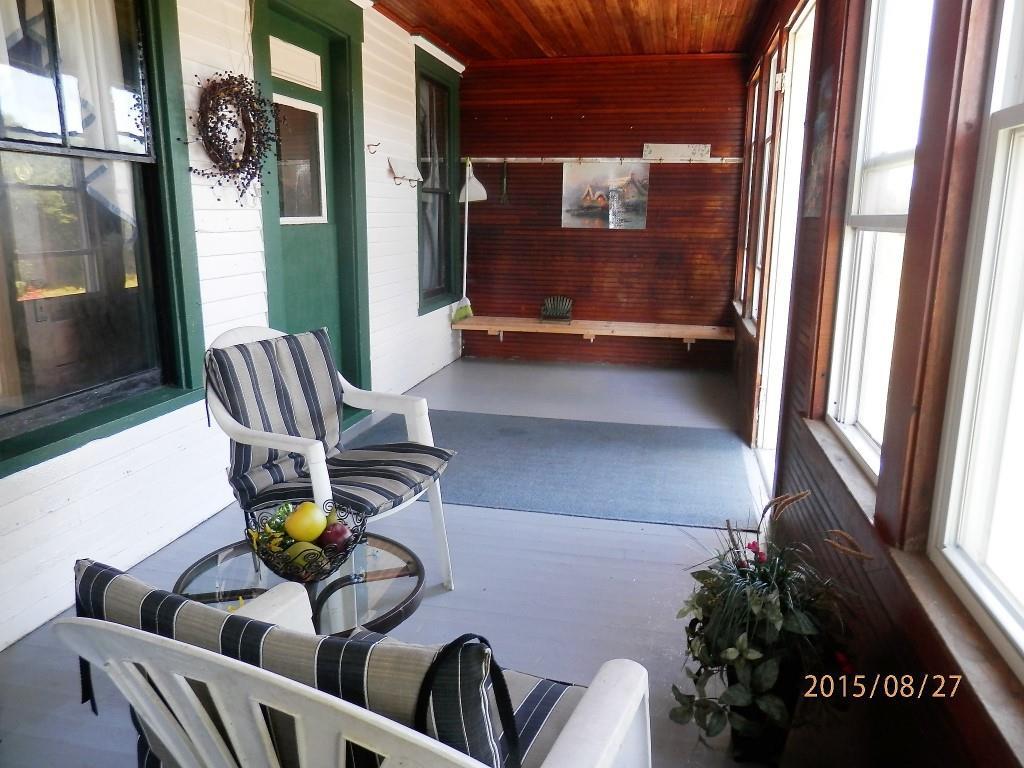 107 Mountain View Road Thorndike, ME 04986 - Photo 14 of 35 Relaxing on your front porch.
