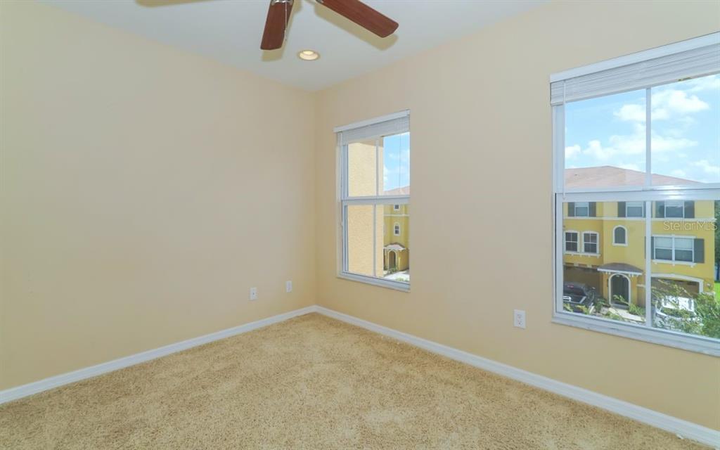 7339 Black Walnut Way Lakewood Ranch, FL 34202 - Photo 18 of 27 an empty room with a window