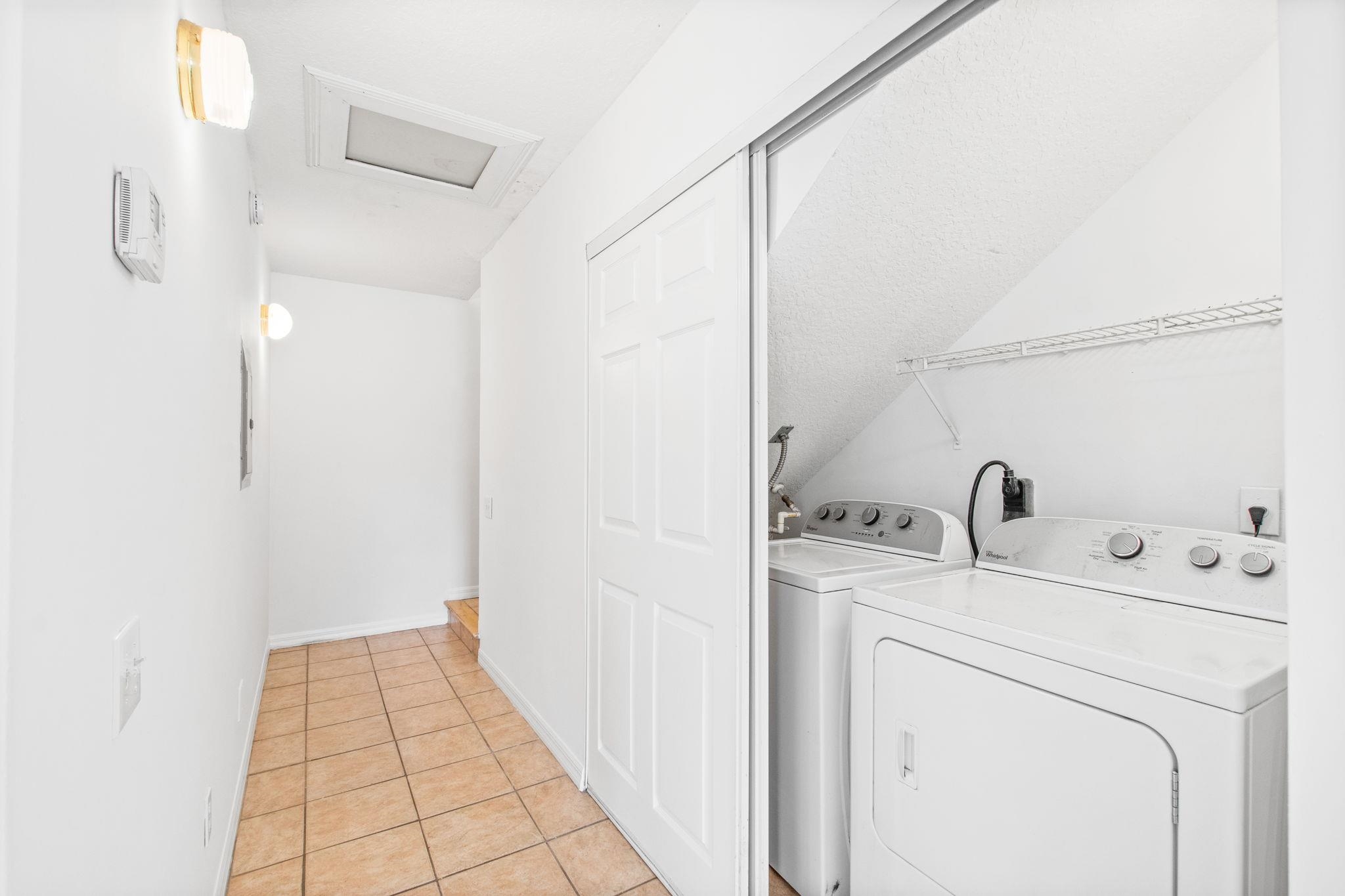 202 F Street St. Augustine, FL 32080 - Photo 14 of 28 a utility room with dryer and washer