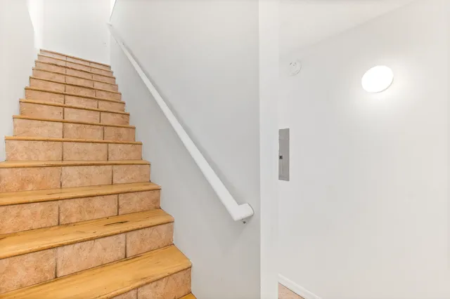 a bathroom with a tub and shower