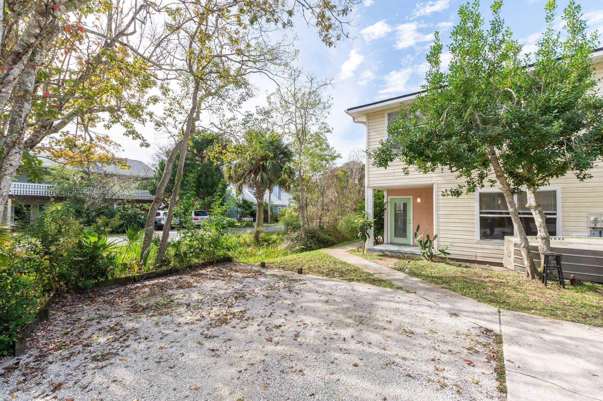 202 F Street St. Augustine, FL 32080 - Photo 2 of 28 a view of a house with a yard and tree s